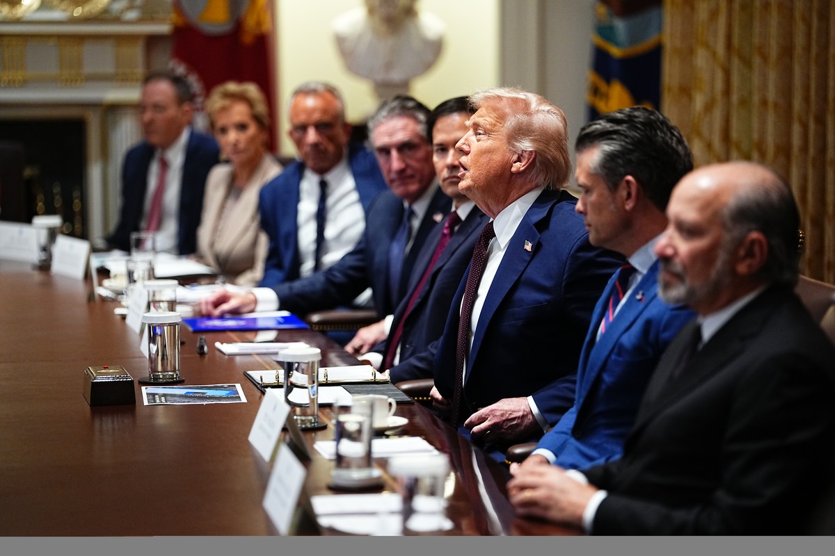 epa12324684 United States President Donald J Trump calls on a member of his Cabinet as he chairs the meeting in the Cabinet Room of the White House in Washington, DC, USA, 26 August 2025. EPA/AARON SC ...