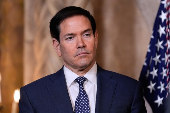 Secretary of State Marco Rubio listens as President Donald Trump speaks at his Mar-a-Lago club, Monday, Dec. 22, 2025, in Palm Beach, Fla. (AP Photo/Alex Brandon)
Marco Rubio