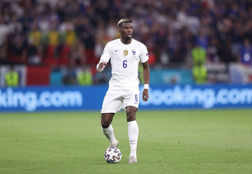 epa09297299 Paul Pogba of France in action during the UEFA EURO 2020 group F preliminary round soccer match between Portugal and France in Budapest, Hungary, 23 June 2021. EPA/Alex Pantling / POOL (RE ...