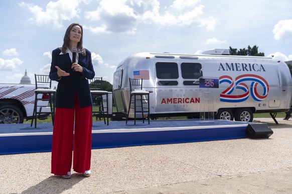 America250 chair Rosie Rios stands near a trailer that will be taken around the country to record oral and visual histories as she speaks during an event to mark the launch of the "Our American S ...