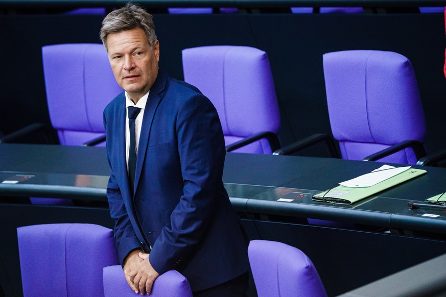 epa10163621 German Minister for Economy and Climate Robert Habeck looks on during the beginning of a session of the German parliament Bundestag in Berlin, Germany, 06 September 2022. The German Bundes ...