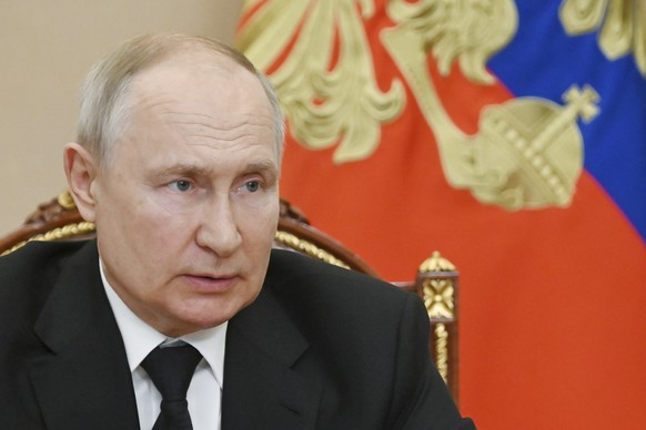 Russian President Vladimir Putin chairs a meeting with members of the Security Council via a video conference at the Kremlin in Moscow, Russia, Friday, Aug. 4, 2023. (Aleksey Babushkin, Sputnik, Kreml ...