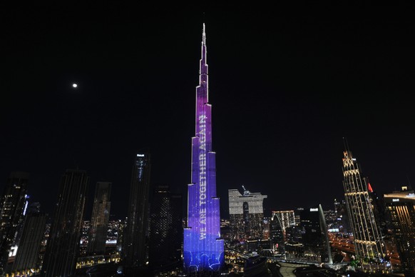 The Burj Khalifa, the world&#039;s tallest building, is illuminated during New Year&#039;s Eve celebrations in Dubai, United Arab Emirates, Sunday, Jan. 1, 2023. (AP Photo/Kamran Jebreili)