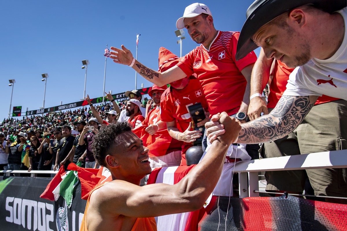 Switzerland's Dan Ndoye celebrates the victory with fans during a Friendly soccer match between Mexico and Switzerland at the Rice-Eccles Stadium, in Salt Lake City, Utah, United States of Americ ...