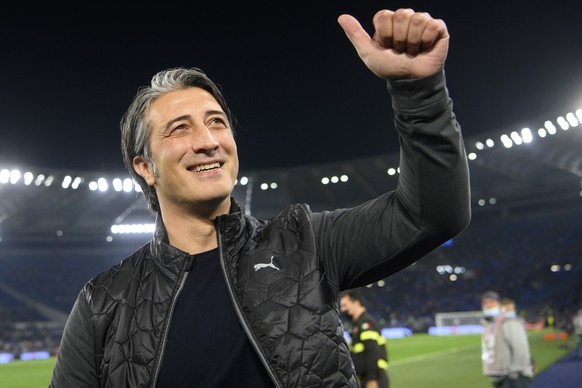 Switzerland&#039;s head coach Murat Yakin cheers in front of the Switzerland&#039;s supporter before the 2022 FIFA World Cup European Qualifying Group C match between Italy and Switzerland at the Stad ...