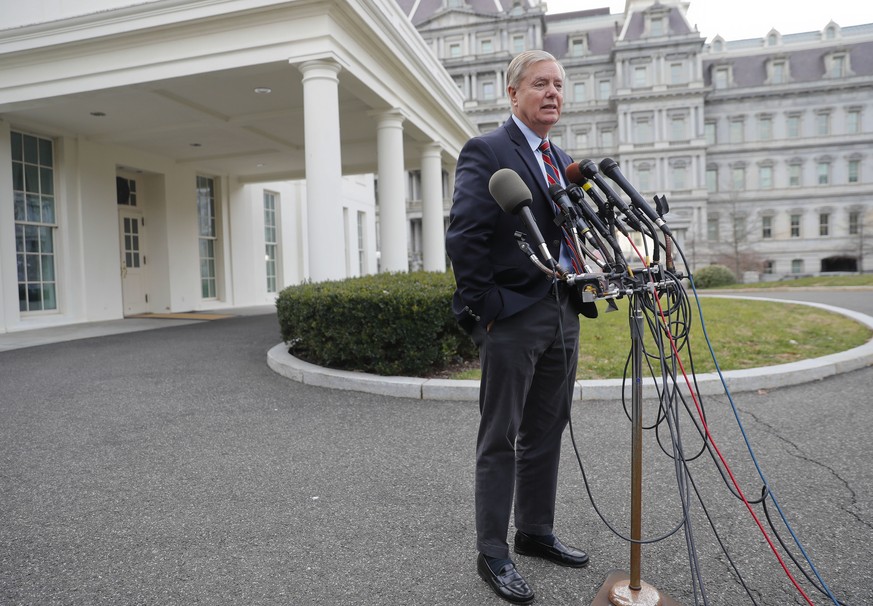 Sen. Lindsey Graham, R-S.C., speaks to members of the media outside the West Wing of the White House in Washington, after his meeting with President Donald Trump, Sunday, Dec. 30, 2018. (AP Photo/Pabl ...