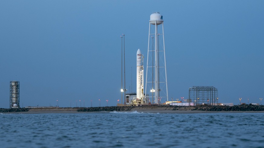 epa06320346 A handout photo made available by the National Aeronautics and Space Administration (NASA) on 10 November 2017 shows the Orbital ATK Antares rocket, with the Cygnus spacecraft onboard, on  ...