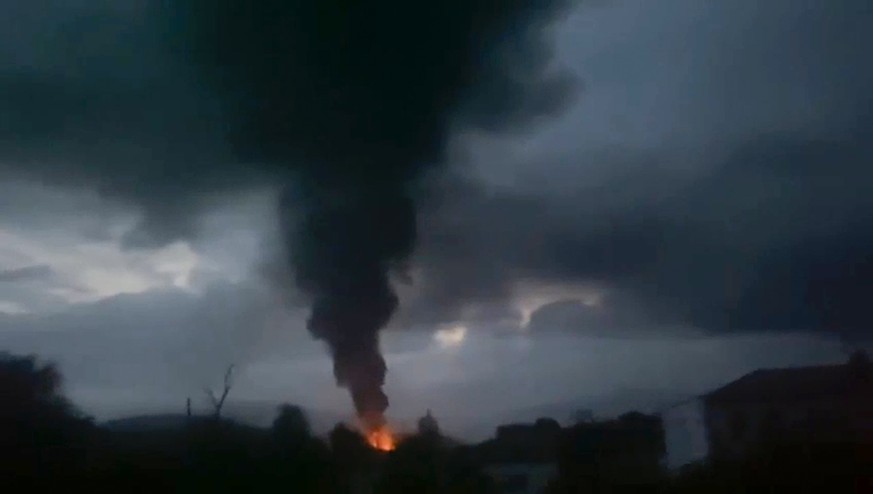 This grab taken from video distributed by Siranush Sargsyan&#039;s Twitter account on Monday, Sept. 25, 2023, shows smoke rising after a fuel depot explosion near Stepanakert, Nagorno-Karabakh. Severa ...