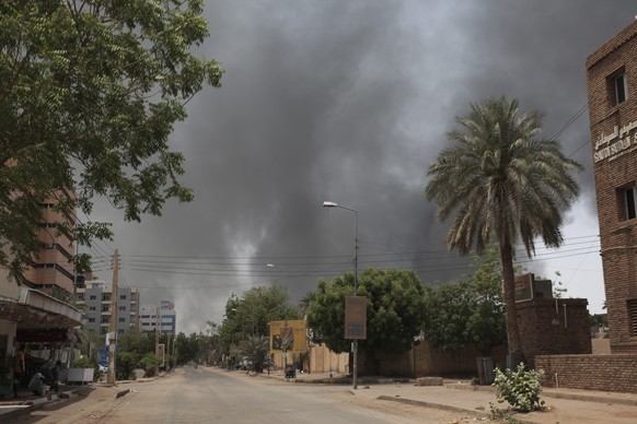 Smoke rises in Khartoum, Sudan, Saturday, April 15, 2023. Fierce clashes between the Sudanese army and the country's powerful paramilitaries erupted in the capital and elsewhere in the ...