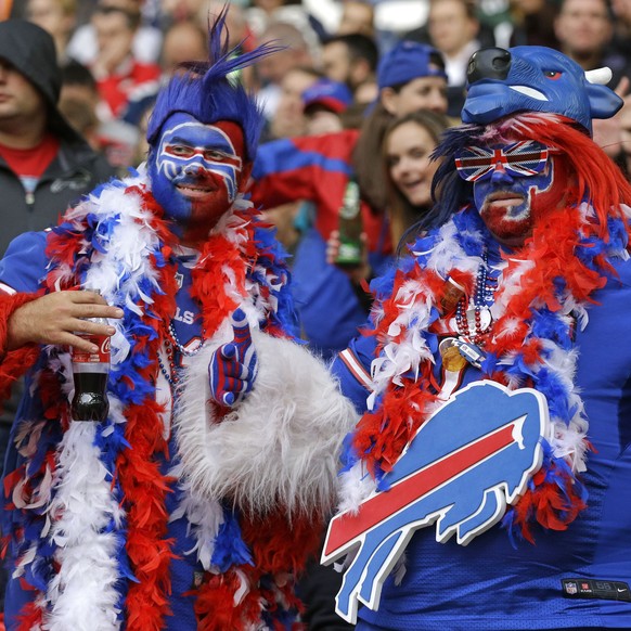 Buffalo Bills fans watch the NFL game between Buffalo Bills and Jacksonville Jaguars at Wembley Stadium in London, Sunday, Oct. 25, 2015. (AP Photo/Matt Dunham)