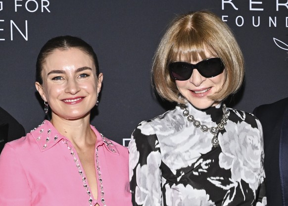 Mark Guiducci, from left, Chloe Malle, Anna Wintour, and Baz Luhrmann attend the Kering Caring for Women Dinner at The Pool on Thursday, Sept. 11, 2025, in New York. (Photo by Evan Agostini/Invision/A ...