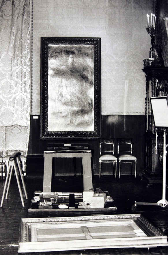 An empty frame which held the Rembrandt painting &#039;The Storm of the Sea of Galilee&#039; is seen on the floor of the Isabella Stewart Gardner Museum in Boston in this March 21, 1990, photo. Two FB ...