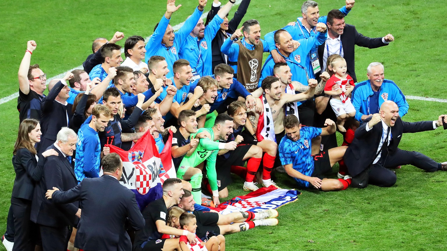 epa06882132 Players of Croatia celebrate after the FIFA World Cup 2018 semi final soccer match between Croatia and England in Moscow, Russia, 11 July 2018. Croatia won 2-1 after extra time.

(RESTRI ...