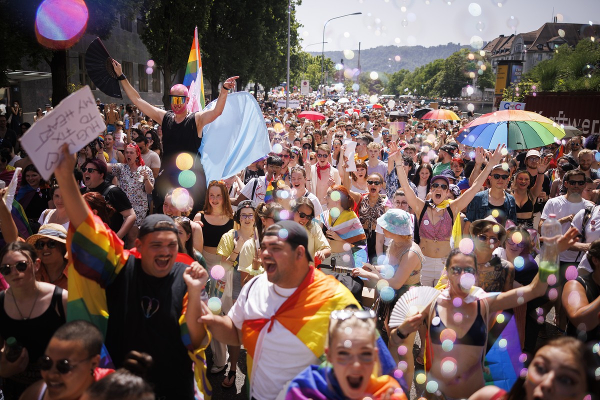People demonstrate at the Zurich Pride parade with the slogan "trans