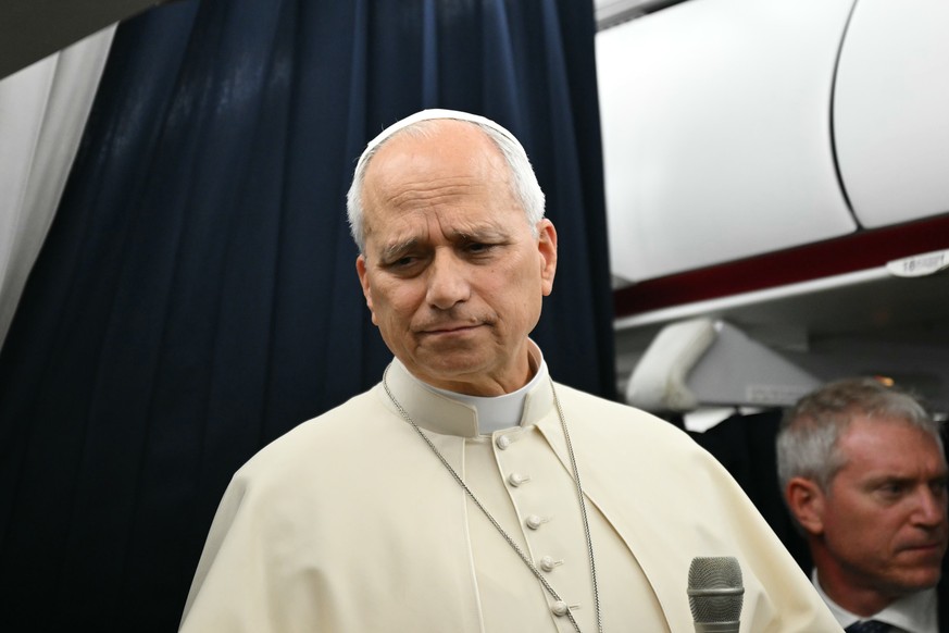 Pope Leo XIV speaks to journalists aboard the flight from Metz, France, to Rome, at the end of his four-day visit to France, Monday, Sept. 28, 2026. (Alberto Pizzoli/Pool Photo via AP)
France Pope
