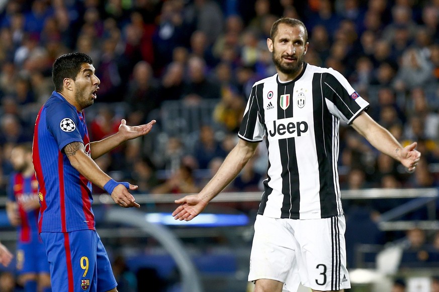 epa05915859 FC Barcelona&#039;s Luis Suarez (L) and Giorgio Chiellini (R) of Juventus react during the UEFA Champions League quarter final, second leg soccer match between FC Barcelona and Juventus FC ...