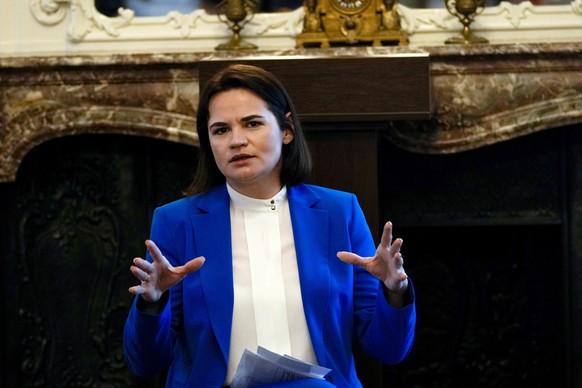 Belarusian opposition politician Sviatlana Tsikhanouskaya talks during a news conference in Brussels, Monday, June 21, 2021. The United States, European Union, Britain and Canada joined forces Monday  ...