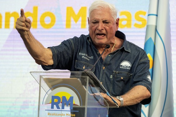 FILE - Former Panama President Ricardo Martinelli speaks to supporters during a campaign rally in Panama City, February 3, 2024. Panamanian authorities on Thursday, February 22, 2024, ordered the arrest...