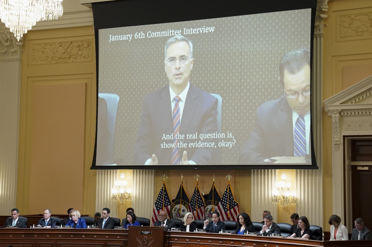 Former White House counsel Pat Cipollone is seen on a video screen as the House select committee investigating the Jan. 6 attack on the U.S. Capitol holds a hearing at the Capitol in Washington, Tuesd ...