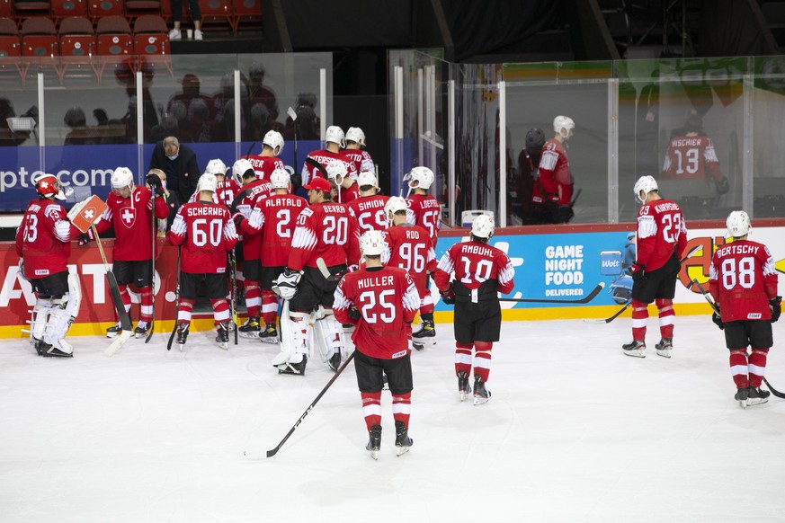 Switzerland&#039;s players leave the ice after losing against the Germany team, during the IIHF 2021 World Championship quarter final game between Switzerland and Germany, at the Olympic Sports Center ...