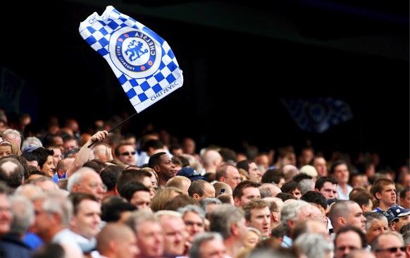 epa07555559 (FILE) - A Chelsea fan waves a flag before the English Premier League soccer match between Chelsea FC and Birmingham City at Stamford Bridge in London, Britain, 12 August 2007 (re-issued 0 ...