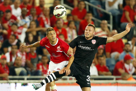 epa04849349 Thun&#039;s Stefan Glarner (R) in action against Maor Melikson (L) of Hapoel Beer Sheva during the UEFA Europa League second qualifying round first leg soccer match between Hapoel Beer She ...