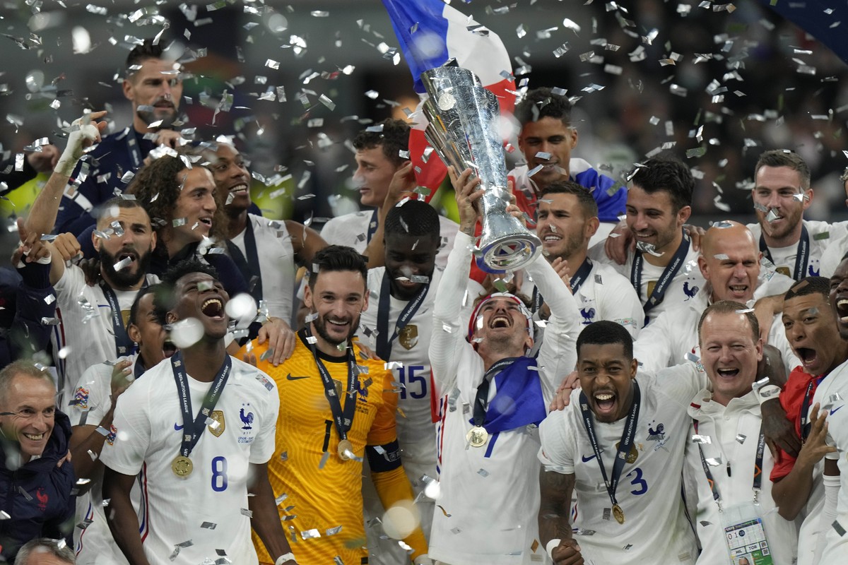 France's players celebrate their victory at the end of the UEFA Nations League final soccer match between France and Spain at the San Siro stadium, in Milan, Italy, Sunday, Oct. 10, 2021. (AP Pho ...