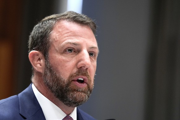 Sen. Markwayne Mullin, R-Okla., the White House pick for homeland security secretary, testifies during Senate Committee on Homeland Security and Governmental Affairs hearing, Wednesday, March 18, 2026 ...