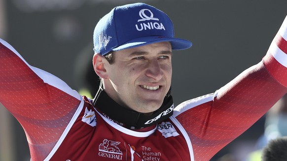 Austria&#039;s Matthias Mayer celebrates taking third place in an alpine ski, men&#039;s World Cup super-G, in Kvitfjell, Norway, Sunday March 6, 2022. (AP Photo/Gabriele Facciotti)