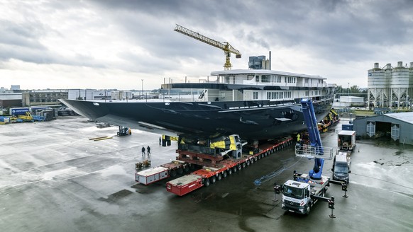 View of a yacht, reportedly being built for Amazon founder Jeff Bezos, on the wharf in Zwijndrecht, near Rotterdam, Netherlands, Wednesday, Oct. 21, 2021. A plan to dismantle a historic bridge in the  ...