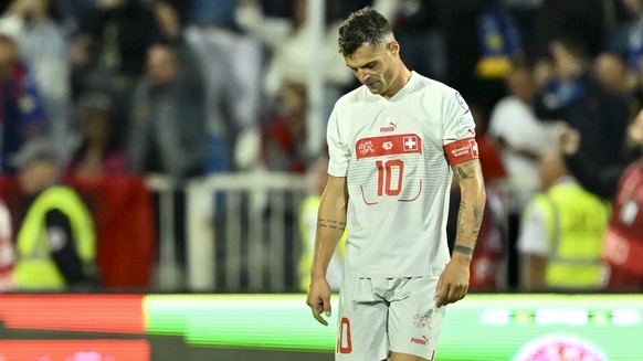 Switzerland&#039;s midfielder Granit Xhaka looks desapointed during the UEFA Euro 2024 qualifying group I soccer match between Kosovo and Switzerland at the stadium Fadil Vokrri, in Pristina, Kosovo,  ...