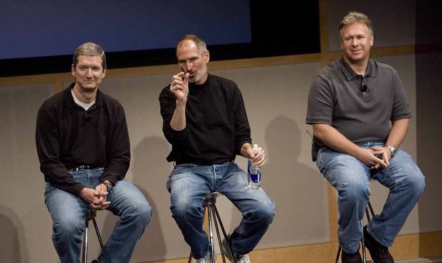 CUPERTINO, CA - AUGUST 7: (L-R) Tim Cook, Chief Operating Officer, Apple CEO Steve Jobs and Phil Schiller, EVP Product Marketing, answers questions after Jobs introduced new versions of the iMac and i ...