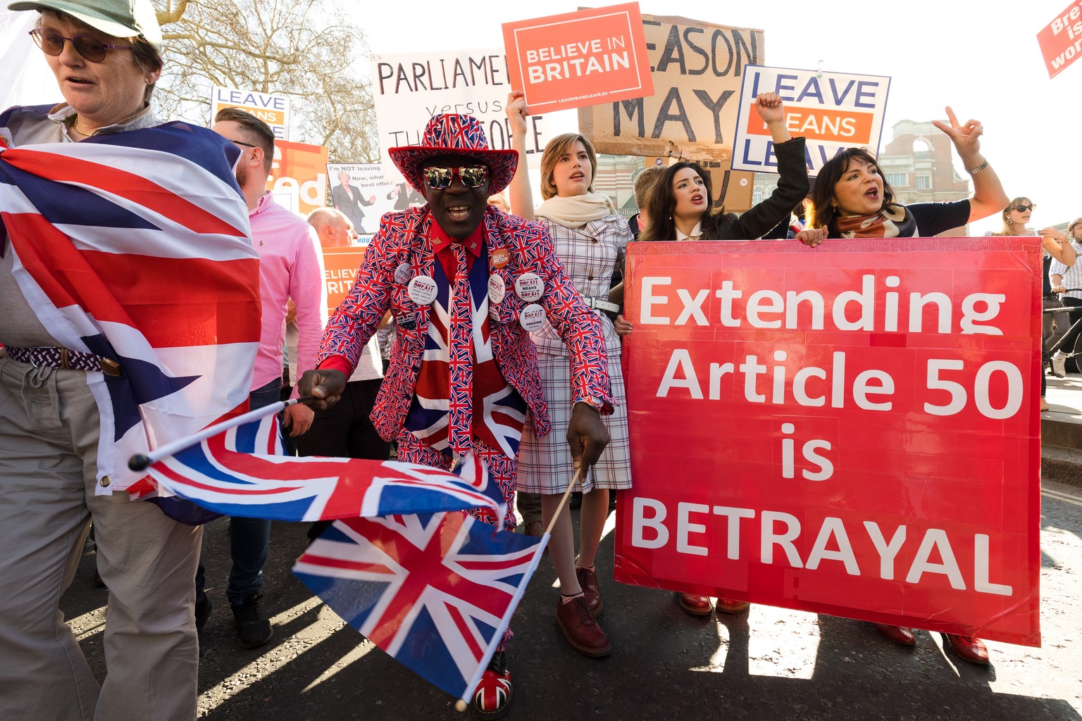 epa07401472 Pro Brexit protesters outside the Houses of Parliament in Westminster, central London, Britain, 27 February 2019. Members of Parliament (MPs) are debating and scheduled to vote on Theresa  ...