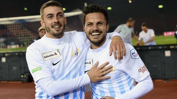 Die Zuercher Marco Schoenbaechler, links, und Antonio Marchesano, rechts, freuen sich nach dem 2-1-Sieg im Schweizer Cup Achtelfinalspiel zwischen dem FC Zuerich und dem FC St. Gallen, im Letzigrundst ...