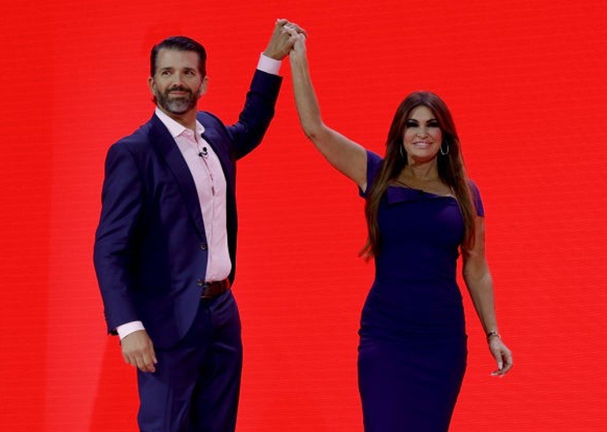 NATIONAL HARBOR, MARYLAND - MARCH 03: Donald Trump Jr. high fives Kimberly Guilfoyle before speaking at the annual Conservative Political Action Conference (CPAC) at the Gaylord National Resort Hotel  ...