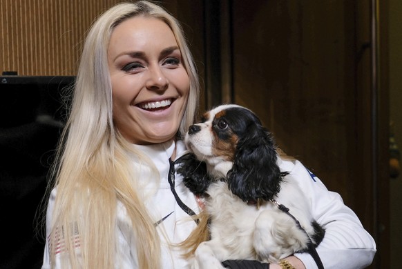 United States alpine skier Lindsey Vonn holds her dog Lucy after a press conference at the 2018 Winter Olympics in Pyeongchang, South Korea, Friday, Feb. 9, 2018. (AP Photo/J. David Ake)