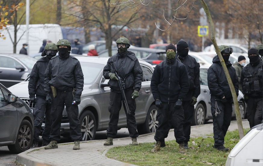 Belarusian riot police prepare to block demonstrators during an opposition rally to protest the official presidential election results in Minsk, Belarus, Sunday, Nov. 15, 2020. Protests have rocked Be ...