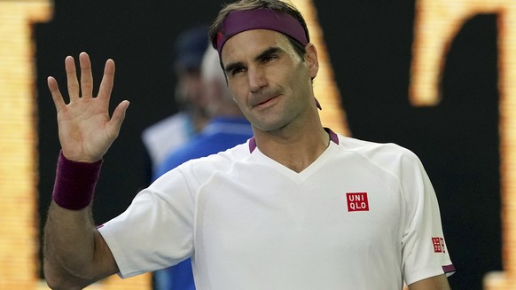 FILE- In this Jan. 28, 2020, file photo, Switzerland&#039;s Roger Federer waves after defeating Tennys Sandgren, of the United States, in their quarterfinal match at the Australian Open tennis champio ...