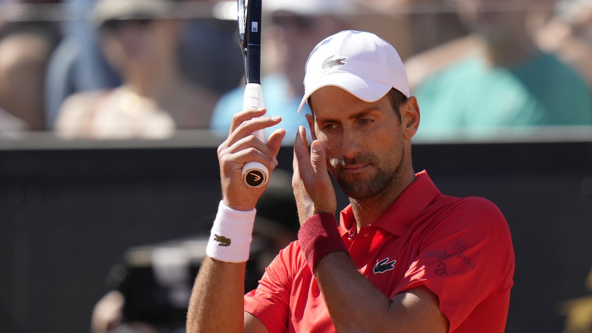 Serbia's Novak Djokovic reacts during a match against Chile's Alejandro Tabilo at the Italian Open tennis tournament in Rome, Sunday, May 12, 2024. (AP Photo/Alessandra Tarantino)