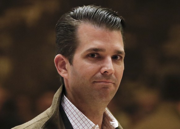 FILE - In this Nov. 16, 2016 file photo, Donald Trump Jr., walks from the elevator at Trump Tower in New York. President Donald Trump’s eldest son on Monday appeared to mock the sexual assault allegat ...