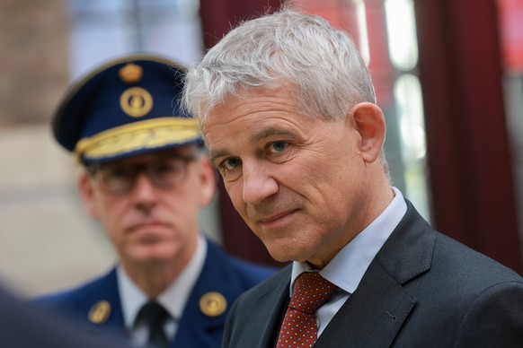 epa12876841 Swiss Federal Councillor for Justice and Police Beat Jans looks on during a briefing with Port of Antwerp officials, featuring an aerial port overview, in Antwerp, Belgium, 09 April 2026.  ...