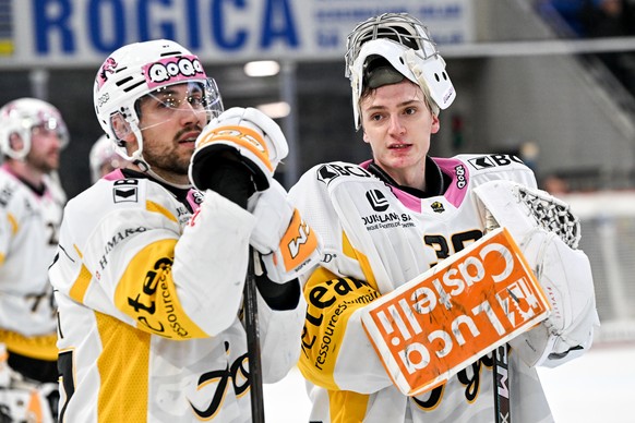 Marco Pedretti (HCA) and goalie Antoine Keller (HCA) disappointed for the loss, during the playout National League game between HC Ambri Piotta and HC Ajoie at the ice stadium Gottardo Arena, Switzerl ...