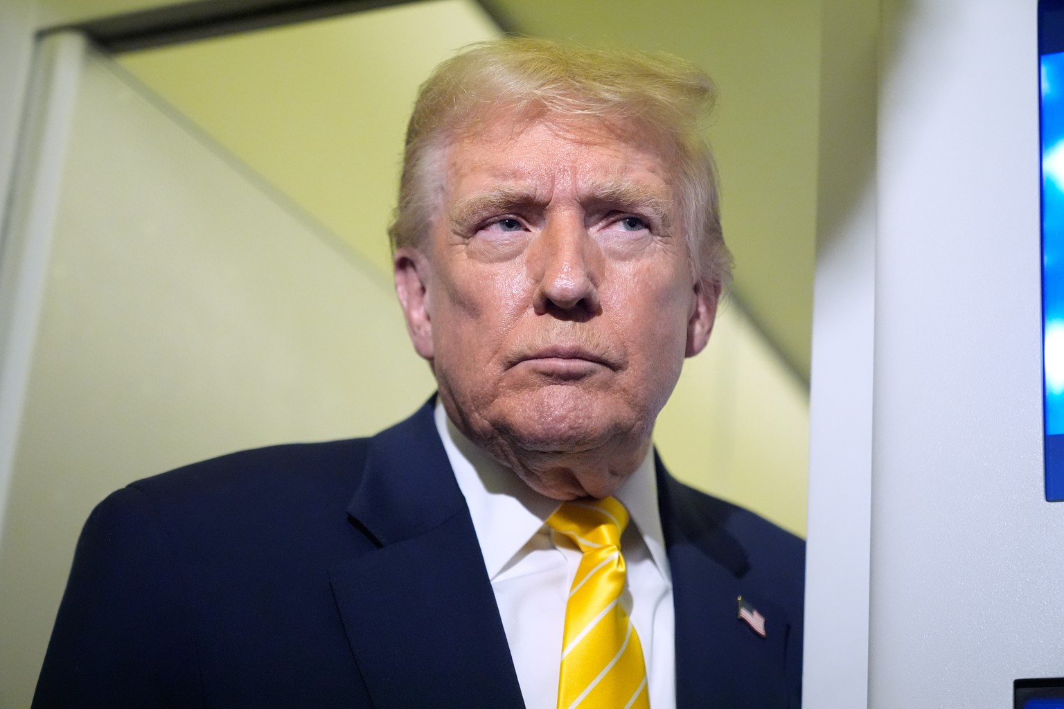 President Donald Trump speaks to reporters on Air Force One on his way to his Mar-a-Lago estate in Palm Beach, Fla., Friday, Nov. 14, 2025. (AP Photo/Manuel Balce Ceneta)
Donald Trump