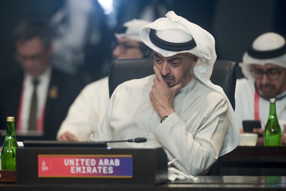 epa10306383 United Arab Emirates President Sheikh Mohamed bin Zayed Al-Nahyan attends a working session on energy and food security during the G20 Leaders Summit in Bali, Indonesia, 15 November 2022.  ...