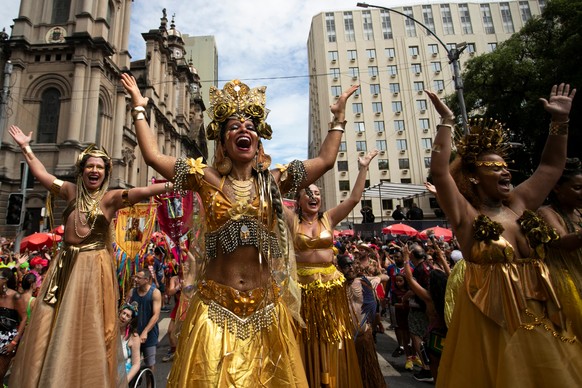 Stilt walker Raquel Poti, center, performs at the Cordao do Boitata" street pre-carnival party in Rio de Janeiro, Sunday, Feb. 8, 2026. (AP Photo/Bruna Prado)
Brazil Carnival