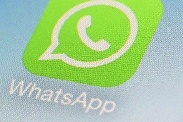 FILE - This Feb. 19, 2014, file photo, shows WhatsApp app icon on a smartphone in New York. Ireland has fined WhatsApp for breaching strict European Union privacy rules by forcing users to consent to  ...
