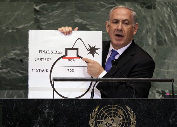In this Sept. 27, 2012, file photo, Prime Minister Benjamin Netanyahu of Israel uses a large, cartoonish diagram of a bomb to dramatize his claim that Iran was 70 percent of the way to enriching urani ...