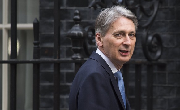 epa05876454 British Chancellor of the Exchequer Philip Hammond, arrives in 10 Downing Street for a cabinet meeting in central London, Britain, 29 March 2017. The Governments bill triggering Brexit pas ...
