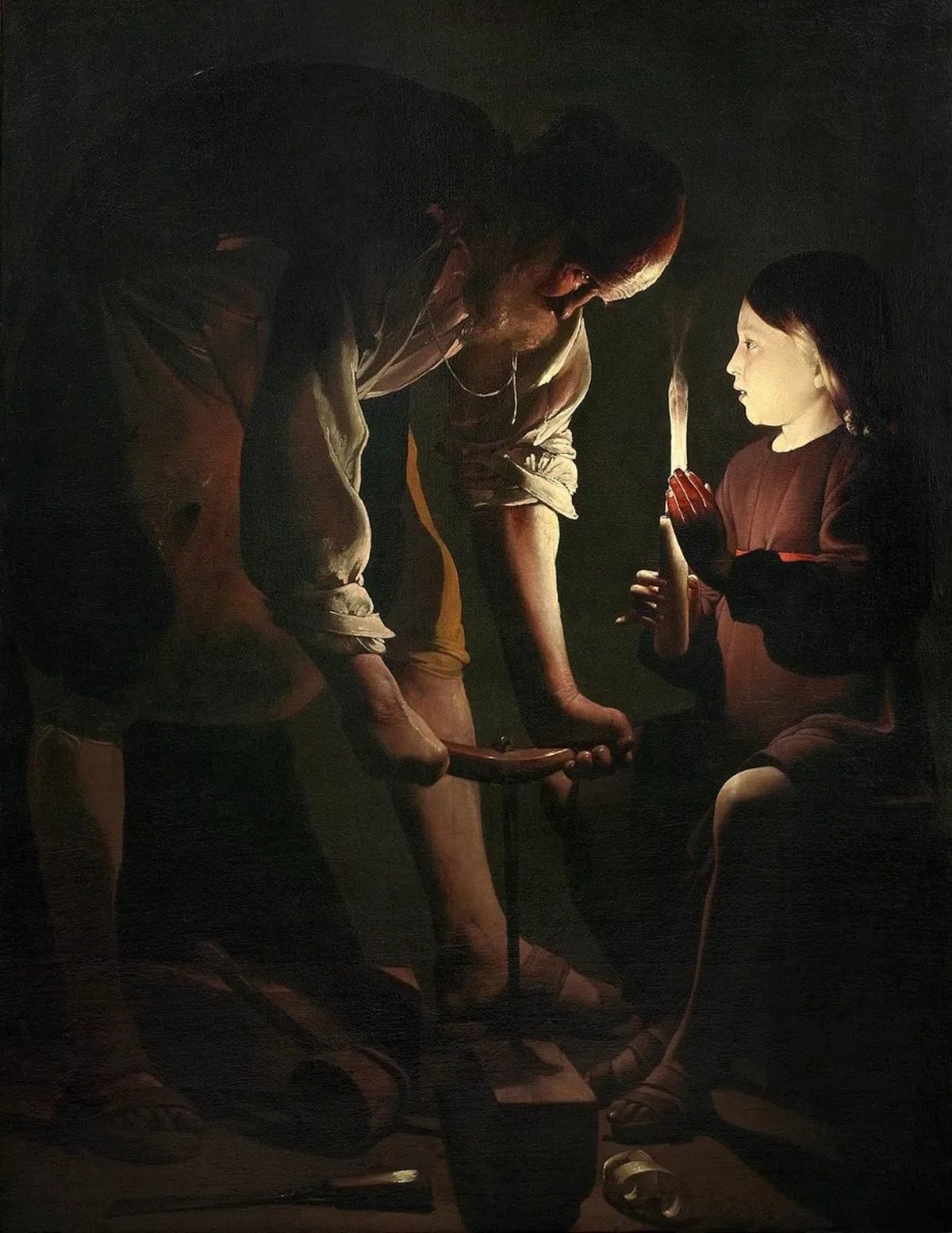 «Joseph le charpentier» en plein travail, mis en scène par Georges de La Tour en 1642.
https://commons.wikimedia.org/wiki/File:Saint_Joseph_Charpentier.jpg