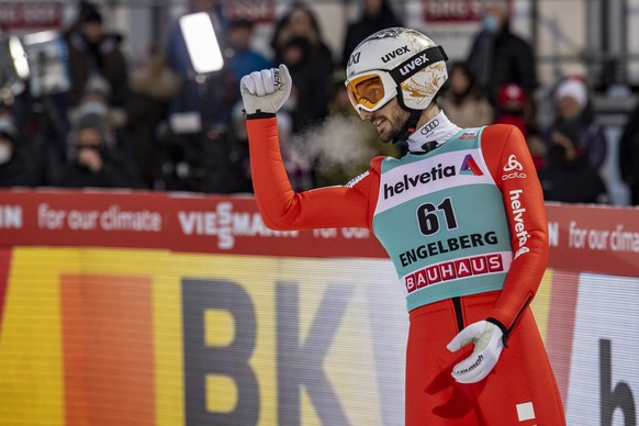 Kilian Peier from Switzerland reacts at the men&#039;s ski jumping FIS World Cup in Engelberg, Switzerland, Sunday, December 19, 2021. (KEYSTONE/Urs Flueeler)